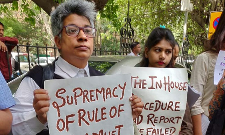 Women Protest Outside SC Against Clean Chit To CJI In Sexual Harassment Case Women Protest Outside SC Against Clean Chit To CJI In Sexual Harassment Case