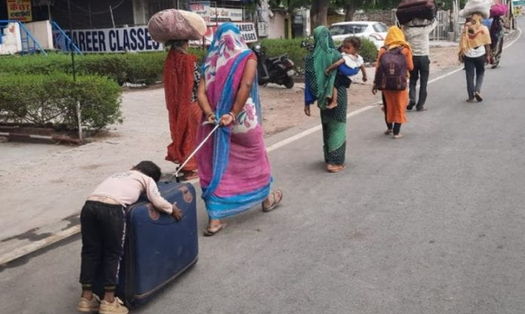 Sufferings Of Migrant Labourers Not Coming To A Halt : NHRC Takes Cognizance Of Mother Pulling Suitcase With Exhausted Kid Sleeping On Sufferings Of Migrant Labourers Not Coming To A Halt : NHRC Takes Cognizance Of Mother Pulling Suitcase With Exhausted Kid Sleeping On