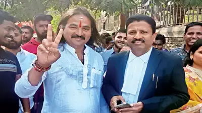 HRS leader Dhananjay Desai and his lawyer Milind Pawar outside Pune Sessions Court (Picture Courtesy : Times of India) HRS leader Dhananjay Desai and his lawyer Milind Pawar outside Pune Sessions Court (Picture Courtesy : Times of India)