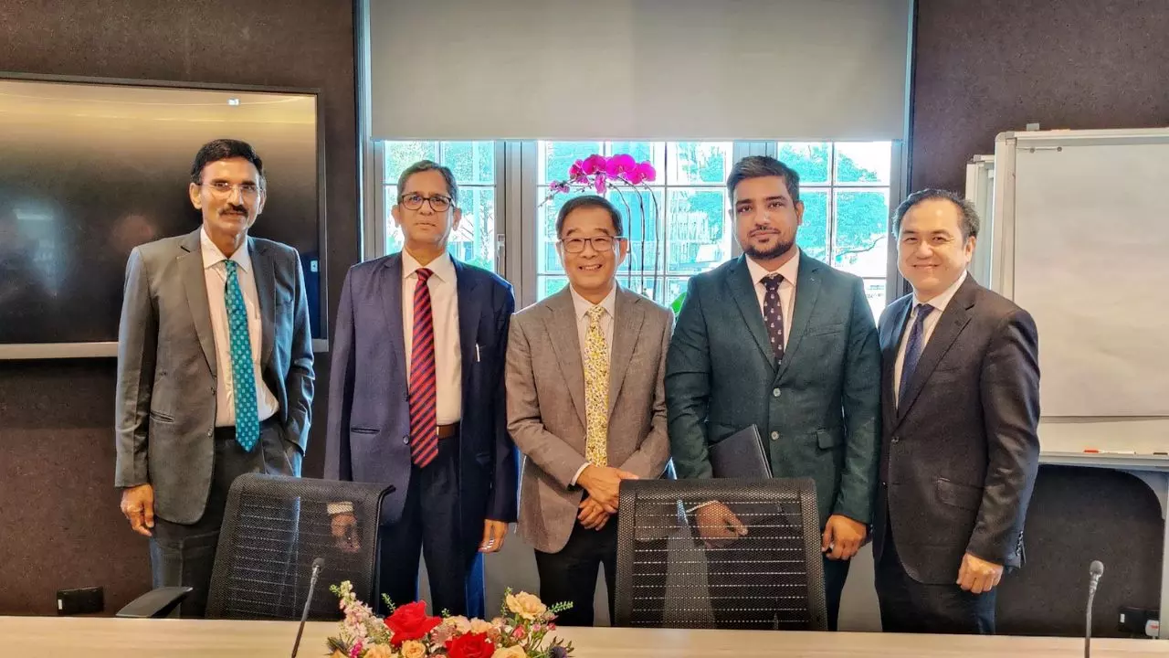IAMC & SIMC Sign MoU In Singapore IAMC & SIMC Sign MoU In Singapore