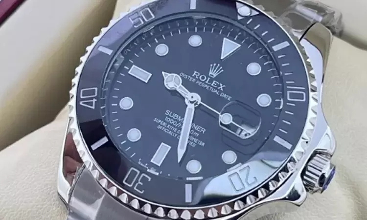 Ernakulum Consumer Commission Holds Luxury Drooms Liable For Misleading Advertisement, Ordered To Refund Rs.13,990 For Duplicate Rolex Watch & Compensation Of Rs.30,000