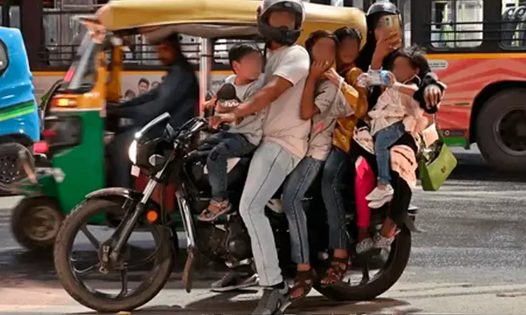 Karnataka High Court Directs State To Implement Rule On Speed Limit, Helmet And Safety Harness For Children Riding Pillion Karnataka High Court Directs State To Implement Rule On Speed Limit, Helmet And Safety Harness For Children Riding Pillion