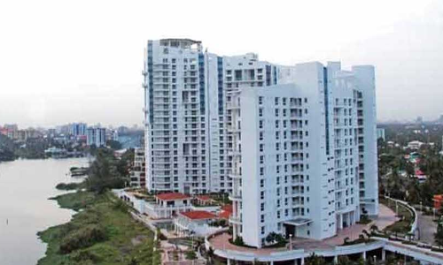 Delhi State Commission Holds DLF Gayatri Developers Liable For Delay In Completion Of Housing Project; Directs Refund Of 15 Lakhs Delhi State Commission Holds DLF Gayatri Developers Liable For Delay In Completion Of Housing Project; Directs Refund Of 15 Lakhs